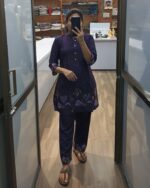 Model wearing deep purple embroidered kurta set with matching pants – elegant ethnic cord set for women