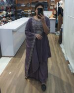 Model wearing mauve embroidered suit set with dupatta – designer ethnic wear for women perfect for weddings and festive occasions